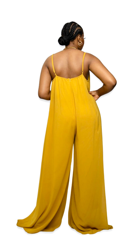 
                  
                    FLUID JUMPSUIT
                  
                